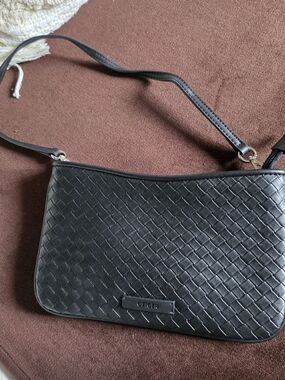 Black Woven Shoulder Bag by Geiger